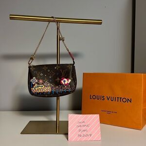Authentic Louis Vuitton holiday animation mini pochette accessoires